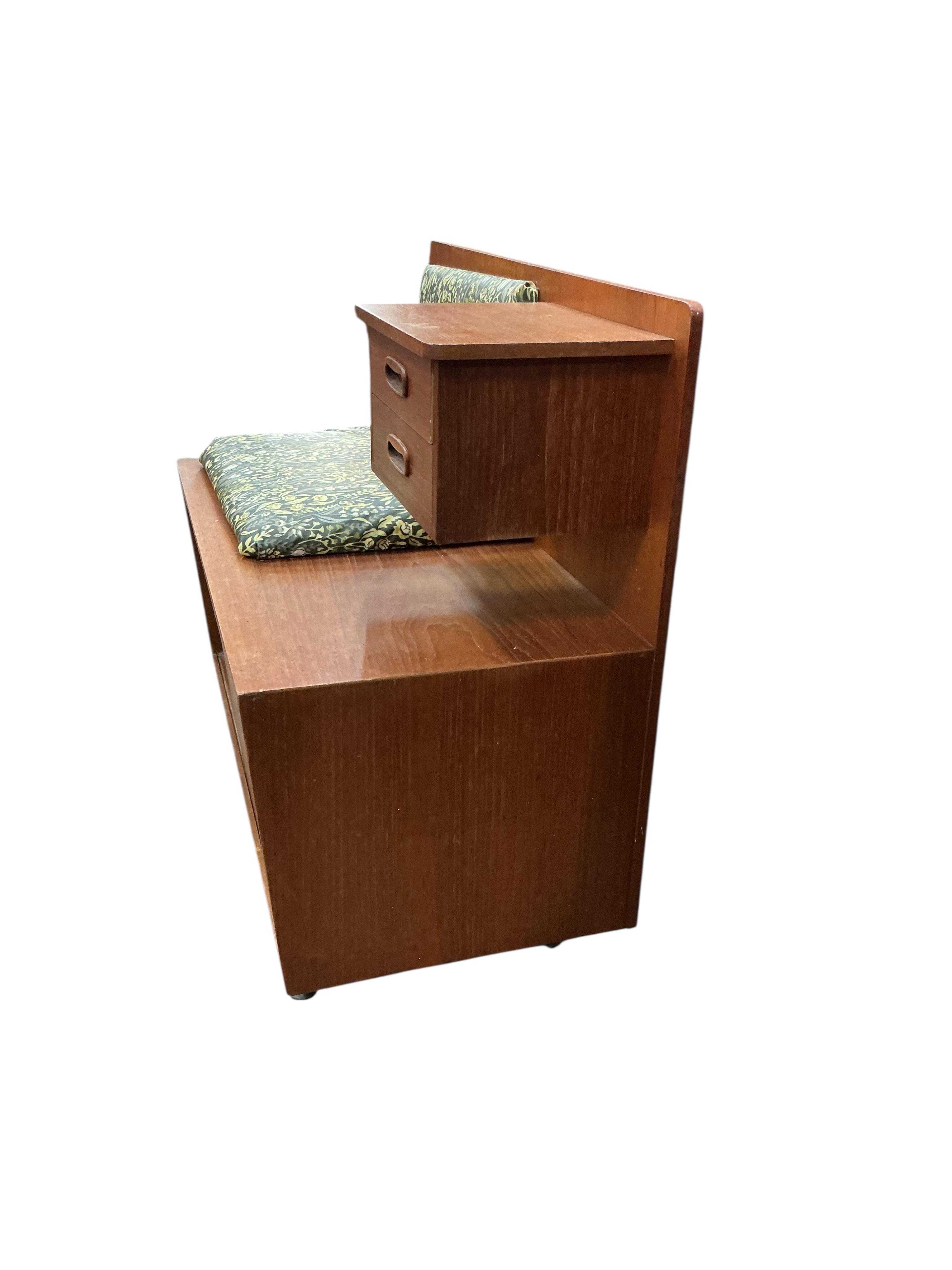 A mid century G Plan teak telephone table, width 84cm, depth 42cm, height 76cm